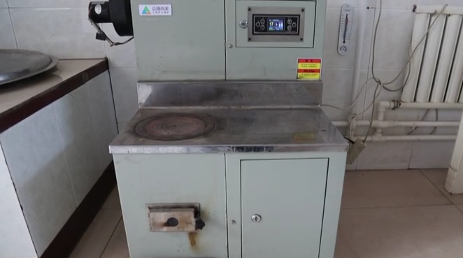 生物質取暖爐讓新農村過上環保暖冬